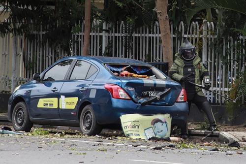 Las autoridades recaban evidencias tras la explosión. (Foto: AFP)