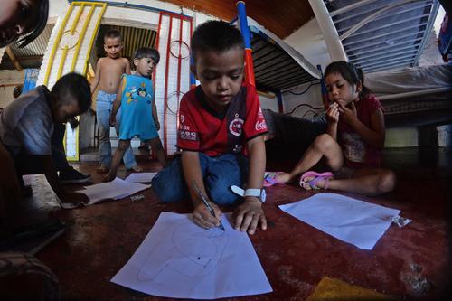 Los niños en el albergue Todo Por Ellos, en Tapachula, cuentan historias escalofriantes sobre lo que vivieron en su natal Honduras. (Foto: Esteban Biba/Soy502)