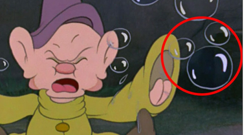 Las burbujas de Tontín esconden a Mickey. 