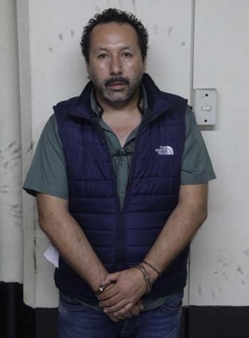 Julio César Aldana es el que recibe la llamada del prófugo Mynor Pineda y le informó que dieron a JC Mónzon 2.3 millones de quetzales. (Foto: MinGob) 
