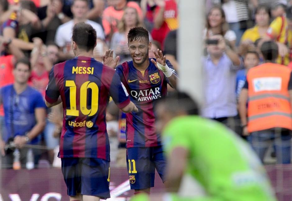 Barcelona sigue invicto en la Liga, ante Granada consiguieron su quinto triunfo del torneo. Neymar hizo triplete y Messi doblete. (Foto: AFP)