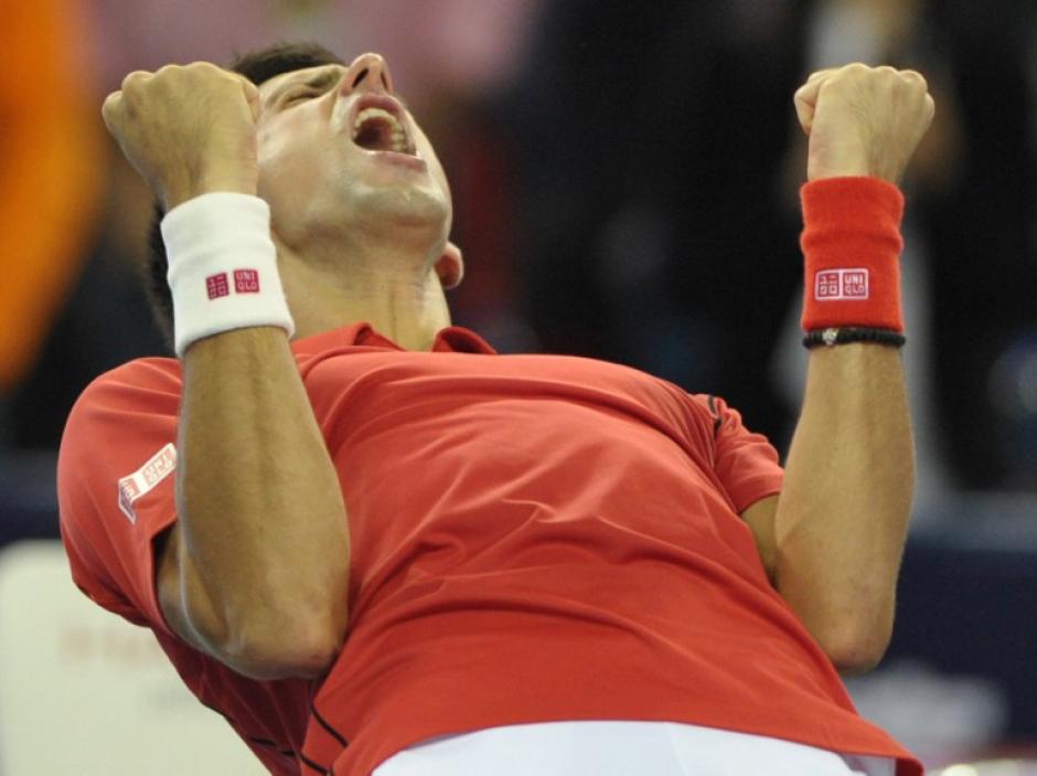 Novak Djokovic festeje eufórico en el duelo contra Jo-Wilfried Tsonga. (Petre Parks/AFP)