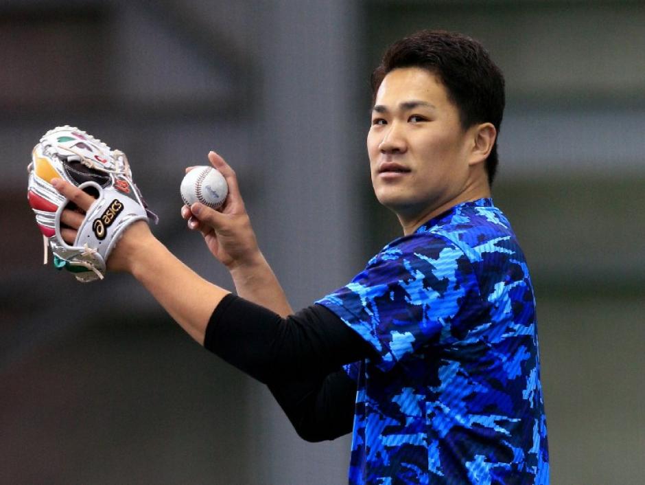 Masahiro Tanaka es el nuevo fichaje de los Yanquis de Nueva York. (AFP)