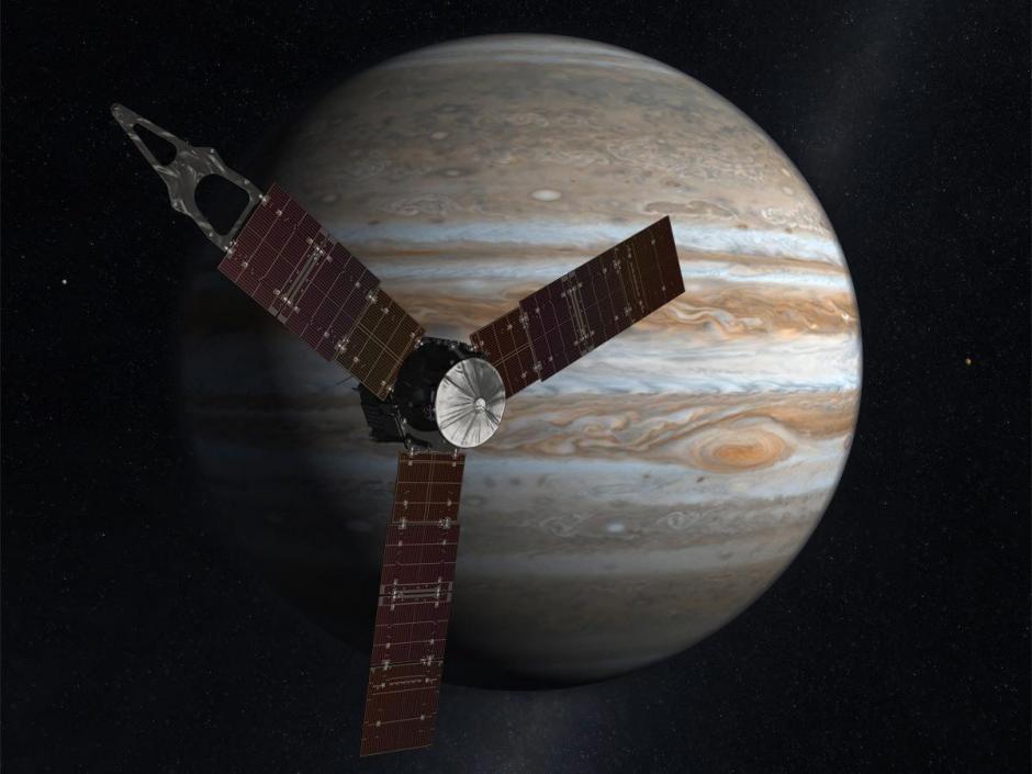 Una representación artística de la nave espacial Juno de la NASA, haciendo uno de sus viajes cerca a Júpiter. (Foto: EFE/NASA)