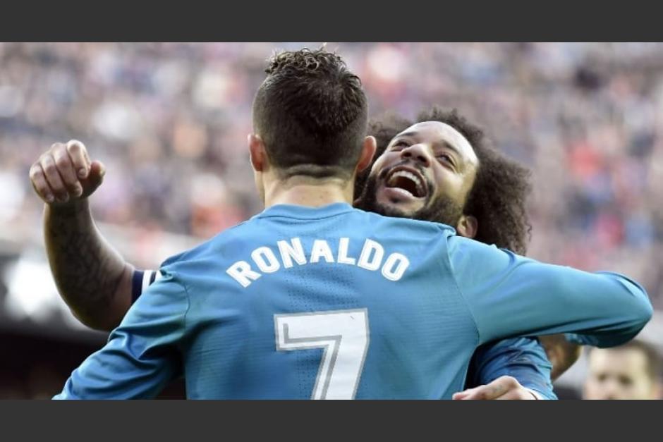 Marcelo y Cristiano Ronaldo festejaron muchos goles en el Real Madrid. (Foto: AFP)