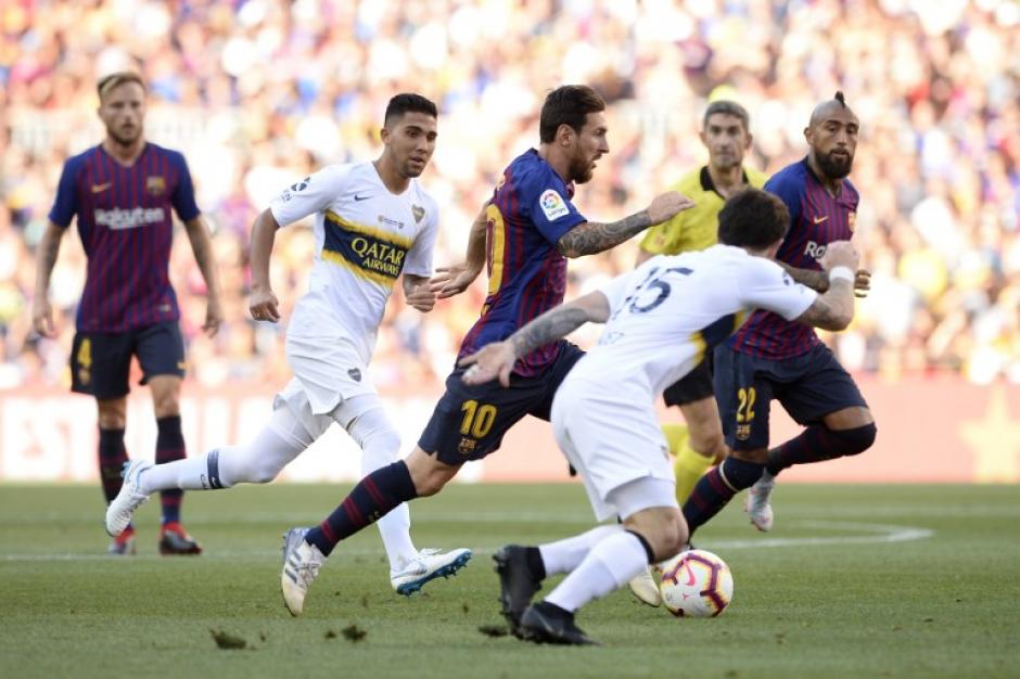 Lionel Messi le marcó su primer gol a Boca Juniors. (Foto: AFP)