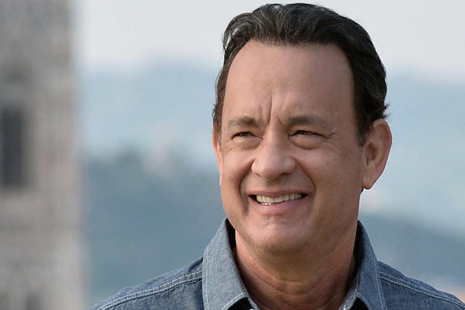 La invitación de Tom Hanks para los comensales quedó registrada en un video. (Foto: AFP)