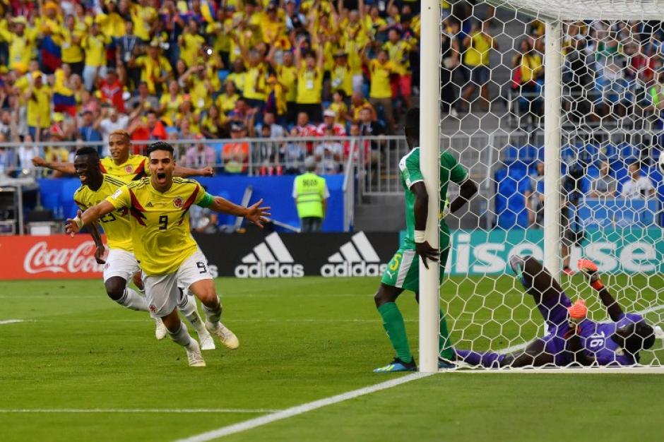 Yerry Mina marcó el gol que sirvió para que Colombia avanzara a octavos de final. (Foto: AFP)