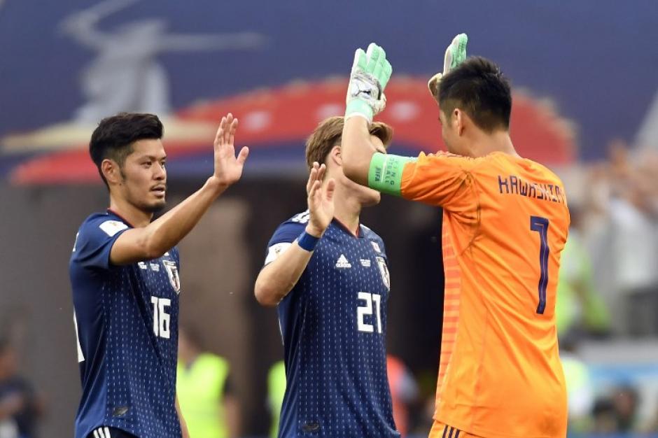 Los japoneses esperaron algunos segundos para celebrar la clasificación. (Foto: AFP)