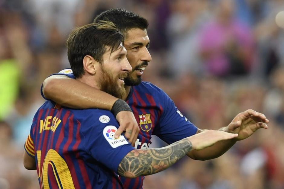 Messi marcó doblete y Suárez aportó un gol más en la goleada del Barsa 6-2 sobre el Huesca. (Foto: AFP)