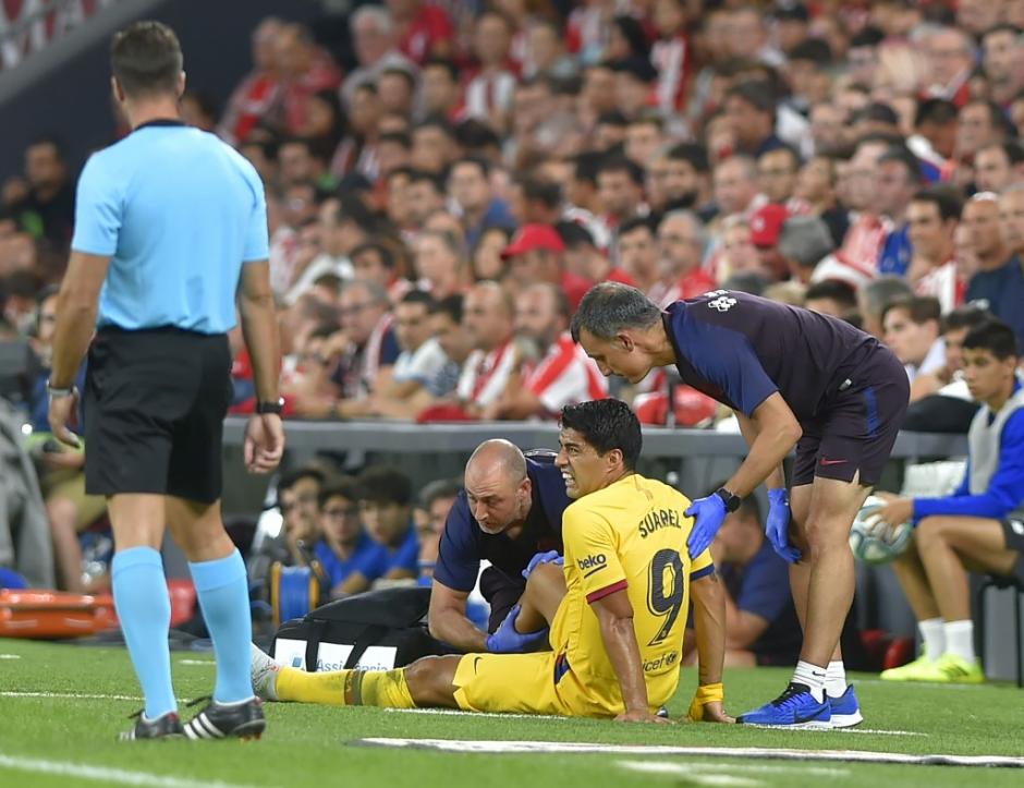 El delantero del Barcelona sufrió una lesión que lo dejaría fuera durante varias semanas. (Foto: AFP)