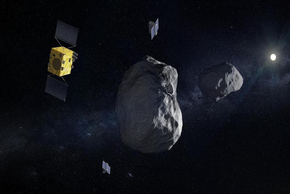 Imagen virtual de la nave Hera y sus dos Cubesats junto al asteroide Didymos y su luna Didymoon (Foto: Agencia Espacial Europea)