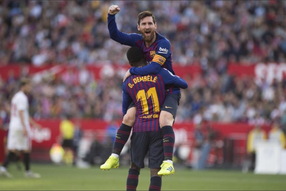Messi festeja uno de sus tres goles ante el Sevilla. (Foto: AFP)