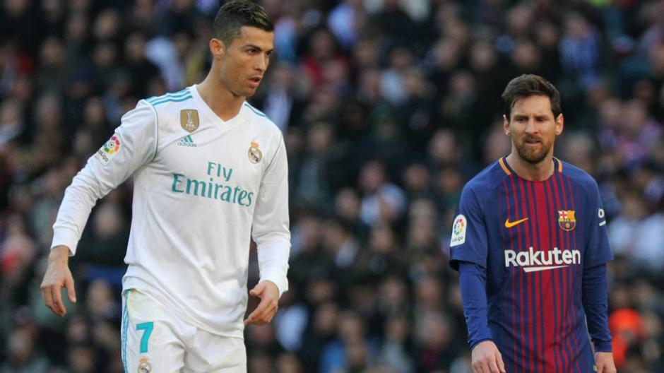 Cristiano Ronaldo y Leo Messi, en un partido entre el Real Madrid y el Barcelona, hace algunos meses. (Foto: as.com)