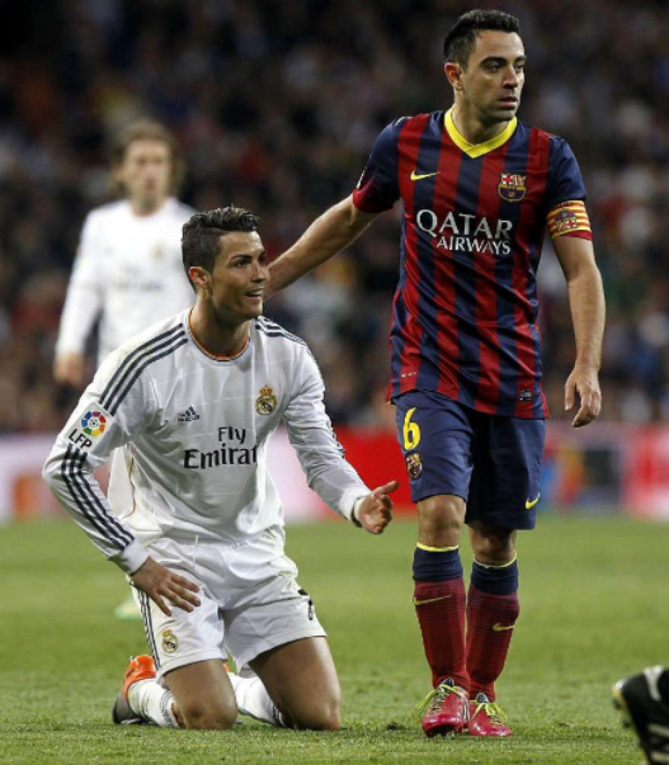 Xavi y CR7 durante un clásico. (Foto: AS)